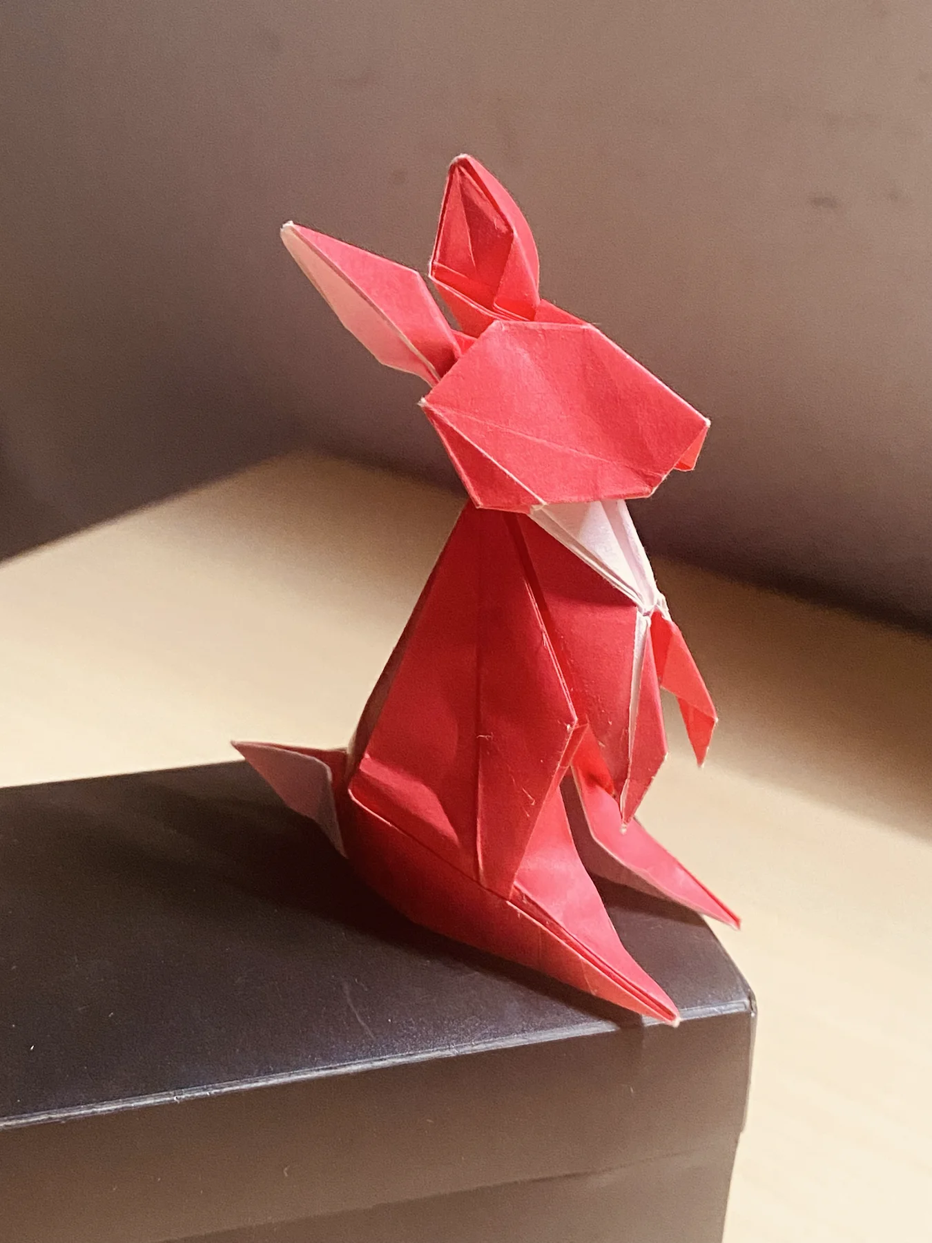 Red and white paper origami rabbit